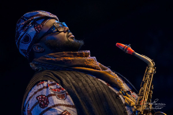 The saxophonist Godwin Louis and his red Syos alto saxophone mouthpiece